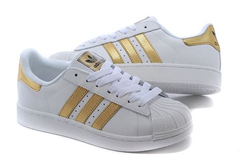 weiße adidas schuhe mit goldenen streifen|adidas superstar schuhe.